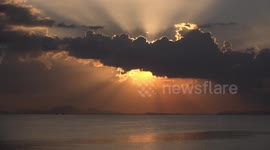 Heavenly sunset sky and clouds, over the ocean.