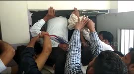Man gets rescued after having his head trapped in an elevator shaft