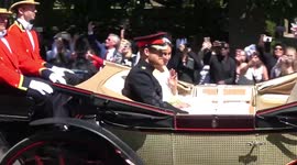 Harry and Meghan pass through Windsor in royal carriage