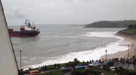 Refloated Russian cargo ship is freed from shallow waters off Cornish beach