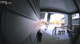 Man falls putting up Christmas lights when his ladder slips off icy roof