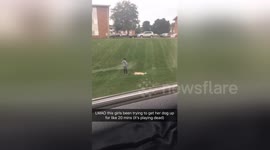 Lazy dog plays possum to avoid getting up to walk with owner