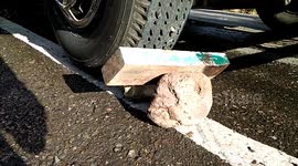 Stones, wooden blocks and sidewalk material used for block fire truck tires from sliding