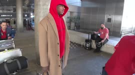 Rapper YG arrives in Los Angeles amid lawsuit