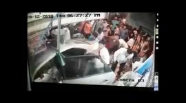 Moment out-of control car rams into crowded shop in India, injuring 3