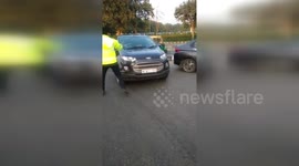 Shocking A man drags cop on bonnet of his car for 100 meters in India