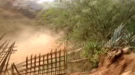 Shocking moment JCB used to bulldoze & chase herd of elephants in southern India.
