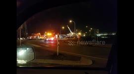 Semi truck on its side