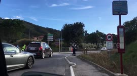 “Yellow Vests” protesters filter cars one by one on a roundabout in the South of France