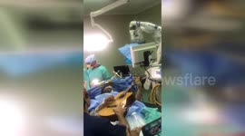 Musician plays guitar during brain surgery in South Africa