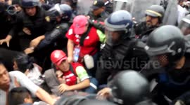 Violent clashes between police and protesters at Mexico City Airport