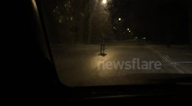 Driver spots hockey fan ice skating down a road at 2am