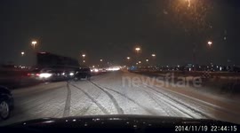 Car spins out of control on snowy highway in Canada