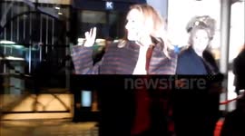 Kim Cattrall departs Mikhail Baryshnikov photograph exhibition launch