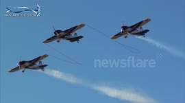 Stunt planes chained together
