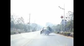 Overloaded truck topples over on highway in China