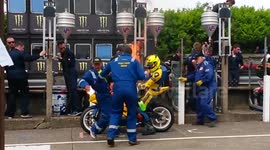 Rider and mechanic engulfed in flames after pitstop failure during UK motorcycle race