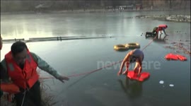 Man rescued from a frozen lake in China