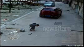 Lucky boy survives being run over by a car