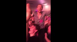 Peter Crouch crowd-surfs at Kasabian gig