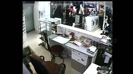 Child Steals Money in a store with complices