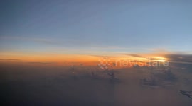 Flying at sunset