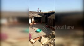 Terrifying moment leopard attacks three people captured in India.