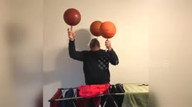 'World record holder' spins three basketballs simultaneously using fingers and toothbrushes