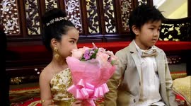Twins, 6, married in Buddhist ceremony as parents believe they were lovers in past life