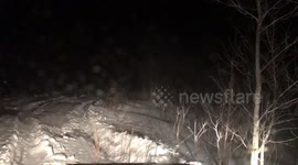 Man in Minnesota goes in ditch trying to get snow storm footage.