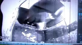 Security camera catches woman throwing rubbish into a lift