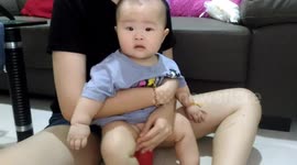 Cute baby training poops in urinal bucket for the 1st time