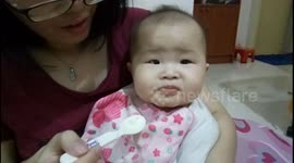 Baby keeps playing his Saliva while eating