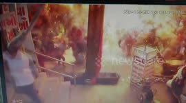 Four injured when gas-filled balloon explodes at Indian market