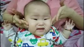 This baby hates face massage