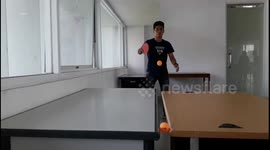 Table tennis player shows off his amazing freestyle tricks