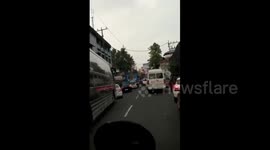 Hero cop makes frantic effort to clear traffic for stranded ambulance