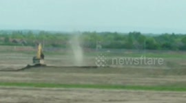 A mini tornado / twister in Warrington, UK (dust devil)