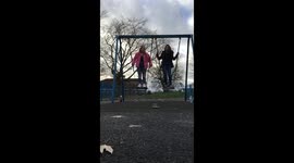 Girl swings,  jumps, fails! Two teens totally fail on a swing