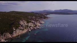 Aerial, Sardinia island and its rocky shore, beautiful emerald sea
