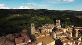 Aerial, little medieval town in Tuscany, San Casciano dei Bagni, Italy on a sunny day