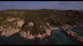 Aerial, Sardinia island and its rocky shore with mediterranean vegetation and beautiful emerald sea