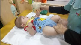 Cute baby pampering at baby spa like a king