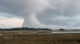 Microburst? Waterspout? Strange cloud formation baffles Oak Island, North Carolina residents