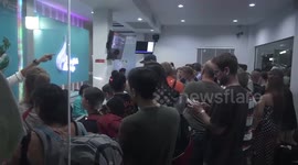 Hundreds of stranded tourists bombard airport as storm approaches Thailand
