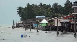 Waves crash on Thai island as locals and tourists brace for Storm Pabuk