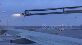 Antifreeze service before take off, St. Petersburg, Russia