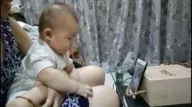 Baby is excited by calling ringtone