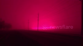 LED greenhouse lights in Canada bathe snow in weird pink light