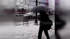 Srinagar city turns into white  after season second snowfall at Kashmir summer capital.  Tourists enjoy .